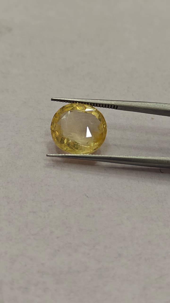 WhatsApp Image 2026-05-26 at 4.36.51 PM (2) Natural Yellow Sapphire - 7.77 Carats (Cylone Sri Lanka) - Image 1